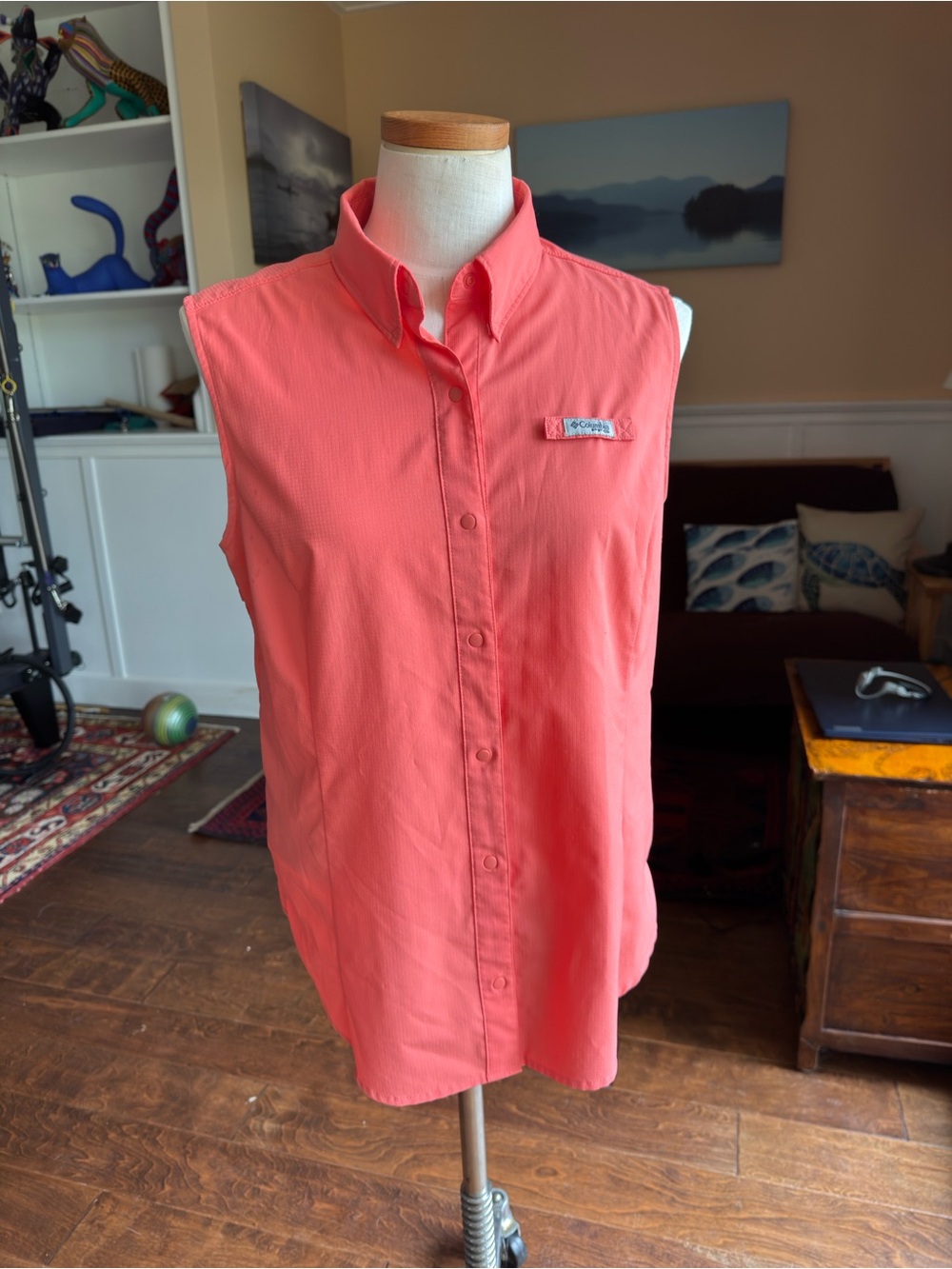 Columbia PFG sleeveless fishing shirt in salmon orange, size L.